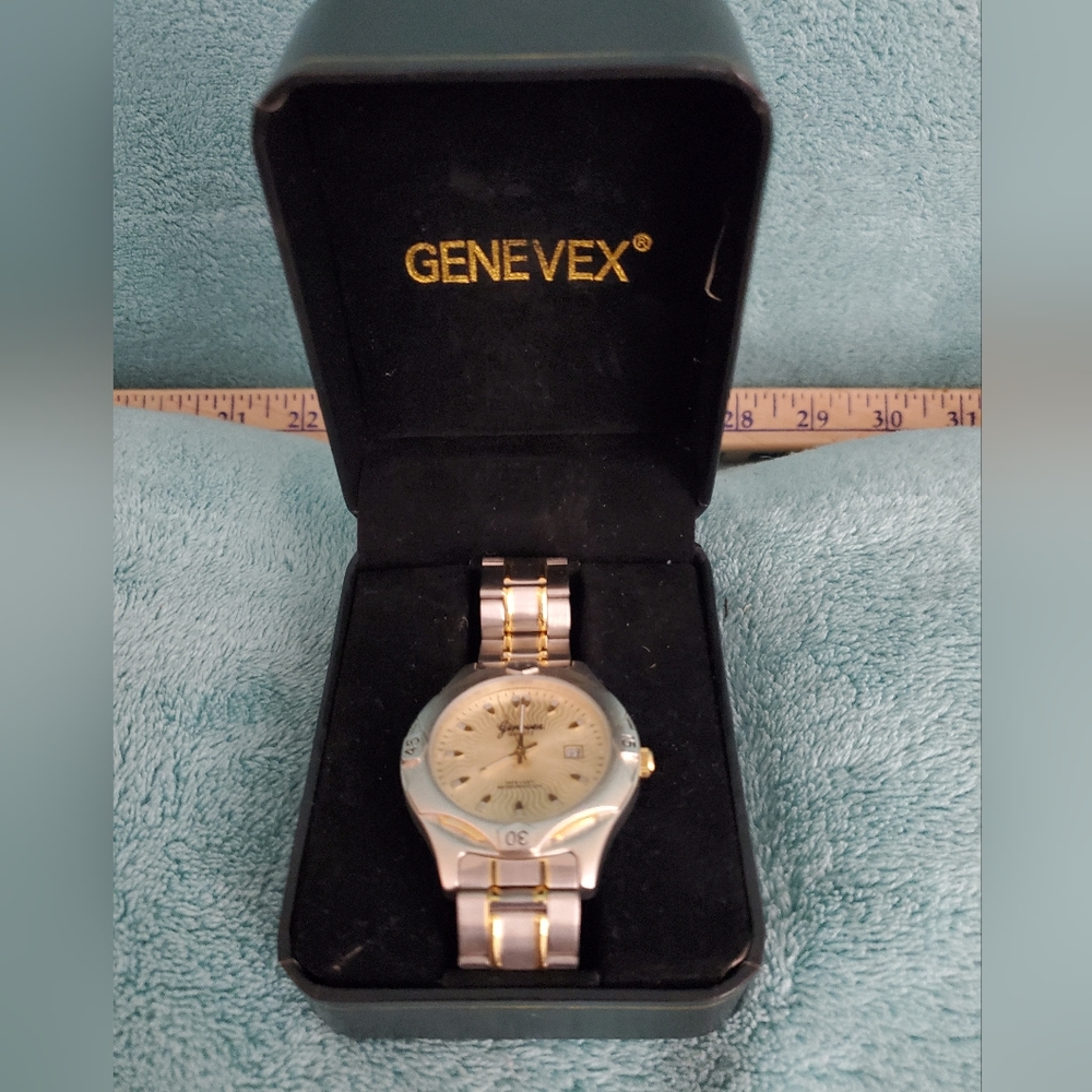 Genevex Men or Womens Watch. Plastic is still on the face and back plate